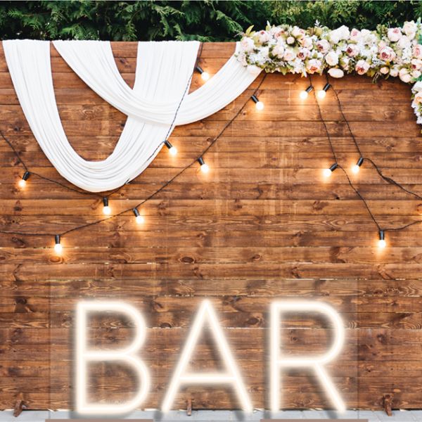 Faux neon bar sign with stand shown at a wedding - from Custom Neon