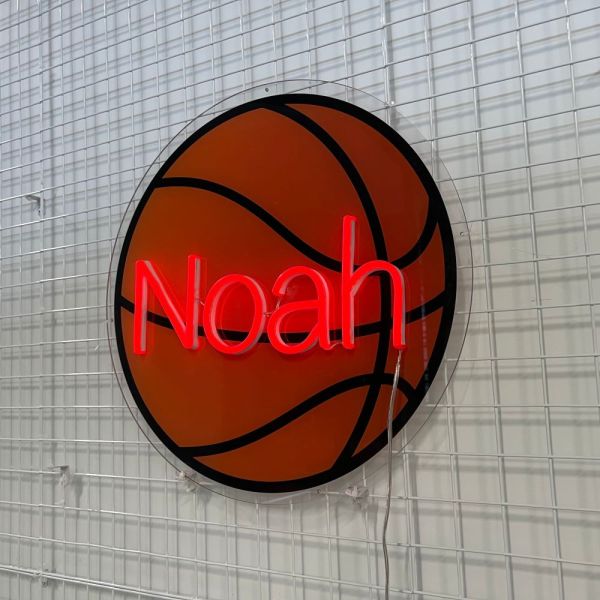 Personalized LED neon name sign with a basketball background from Custom Neon®