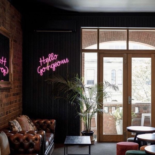 Hello Gorgeous LED neon sign in pink as seen in the cafe @playatrecess - from Custom Neon
