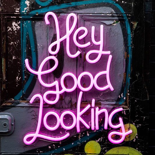 * Hey Good Looking * Pink LED Neon Wall Art on graffiti - photo from Custom Neon (formerly Neon Collective)