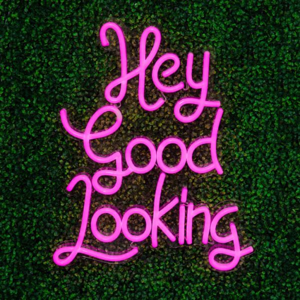 * Hey Good Looking * LED Neon Sign on green wall - photo from CustomNeon.co.uk
