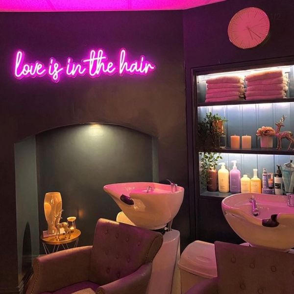 Love is in the hair dark pink LED neon word sign @blushsalon.uk by @customneon