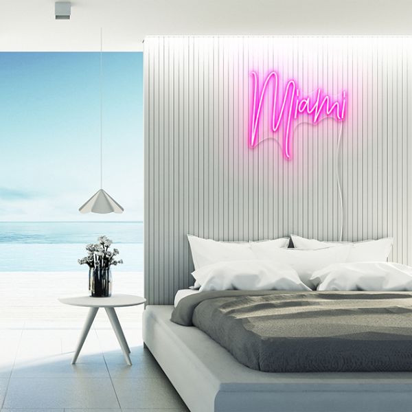 Dark pink CUSTOM NEON® Miami Sign on beach house bedroom wall