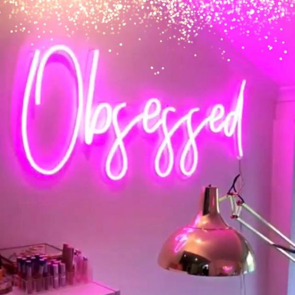 Obsessed LED Neon Light Wall Art shown in a beauty salon - photo Custom Neon®