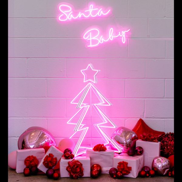 3D Neon Christmas Tree shown with presents and a Santa Baby neon sign - by Custom Neon®