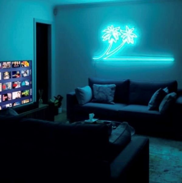 Tropical Dream blue LED neon wall art in a lounge - made by @customneon for @pr0teinshake