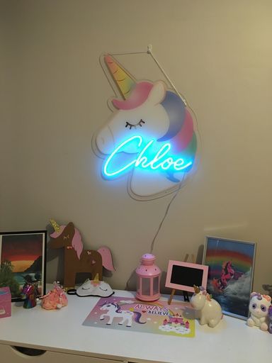 Unicorn neon name sign in blue turned on - from Custom Neon