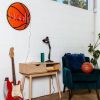 Basketball Name Sign in LED neon flex shown on a white brick wall - from Custom Neon by Neon Collective