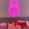Custom Neon® pink bunny face shown as bedroom wall art