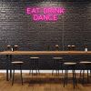 EAT DRINK DANCE pink neon flex sign on brick wall in a pub - from Custom Neon