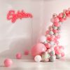 Eighteen Light Sign shown in red with a balloon arch and presents |  Custom Neon®
