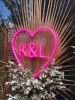 Pink neon flex heart with initials at an event - from Custom Neon
