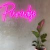 Paradise Neon Sign shown in pink at an ice cream parlor - from CustomNeon.com