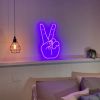 Peace hand LED neon light show in purple above a bed - from Custom Neon