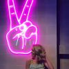 Pink neon peace sign wall mounted - from Custom Neon