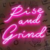 Rise and Grind pink CUSTOM NEON® sign shown illuminated