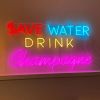 Save Water and Drink Champagne neon bar sign from Custom Neon 
