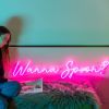 Wanna Spoon? pink neon flex light shown illuminated above a bed - from Custom Neon