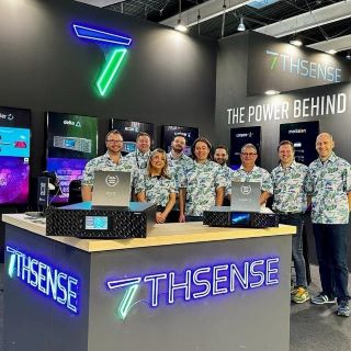 Custom Neon® blue and green tradeshow signage @7thsense00 @ise_show