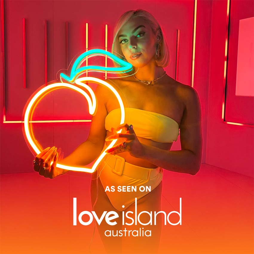 Custom Neon® peach held by Holly Oakes-Ferguson - made for the Love Island Australia Merchandise Collection