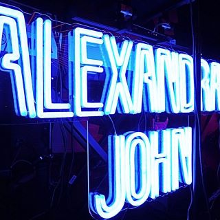 Blue Custom Neon® performing artist sign @alexandrajohnmusic