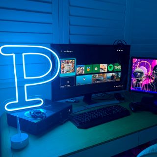 Electric blue LED neon initial made by Custom Neon®