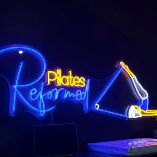 Reformer pilates studio Custom Neon® logo @theresaclaireinthere