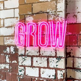 Dark pink GROW sign @growgiesenplantshop by Custom Neon®