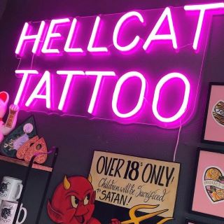 Custom Neon® pink shop sign for @hellcattattoostudio