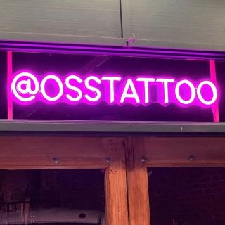 Large neon pink social media handle sign by Custom Neon® for @osstattoo