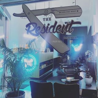 The Resident Barber shopfront showing light signs made by Custom Neon®