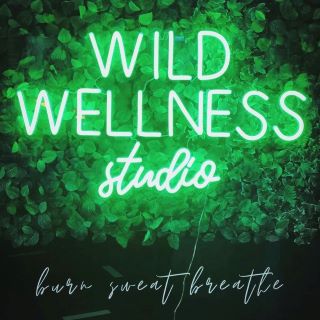 Fitness studio window sign @wildwellnessstudio made by Custom Neon®