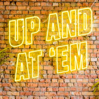 Up and At 'Em yellow wall sign by Custom Neon®