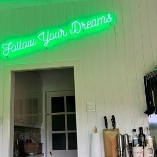 Green Custom Neon® Follow Your Dreams sign @grahamvincent