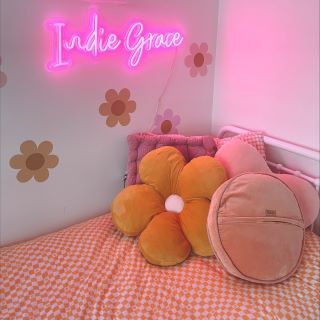 Custom Neon® pink girls name sign above bed