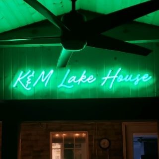 Green personalized house sign by Custom Neon®