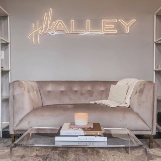 Warm white personalized Custom Neon® sign on living room wall