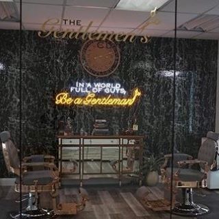 White and yellow slogan sign by Custom Neon® for @thegentlemenscultlery