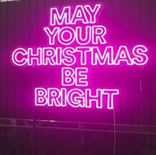 Custom Neon® pink May Your Christmas Be Bright sign in the @davidjones department store