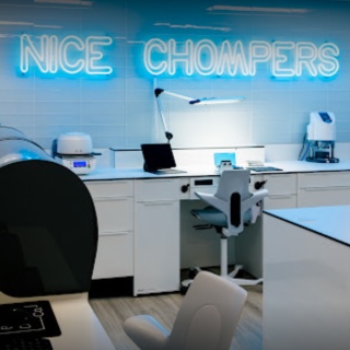Custom Neon® Nice Chompers sign in the dental technician lab @bauerdentalcom