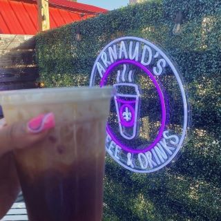 Purple & white outdoor logo sign @arnaudscoffee by Custom Neon® 