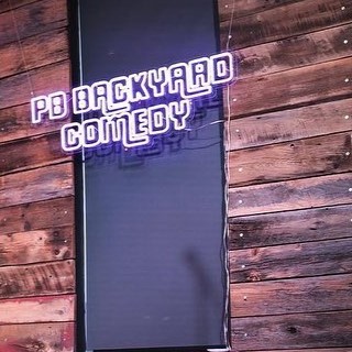 Purple Custom Neon® comedy club sign @backyardcomedy_nashville