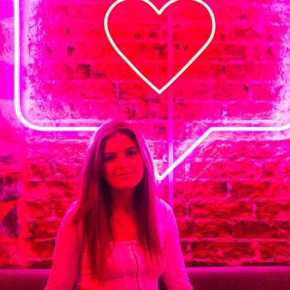 Custom Neon® pink heart in speech bubble on brick wall @badhabitsgsy 