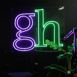 Purple and green Custom Neon® logo @gaylordhansenteam