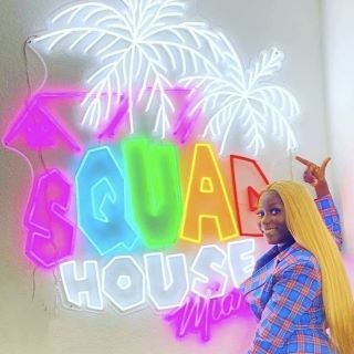 Custom Neon® colorful social media channel logo @squadhouse