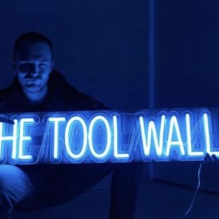 Dark blue Custom Neon® sign The Tool Wall