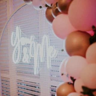 Custom Neon® You + Me wedding sign on arch with balloons @tothewallhire