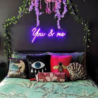 You & Me purple sign above bed made by Custom Neon® for @projectsfromwaltonroad