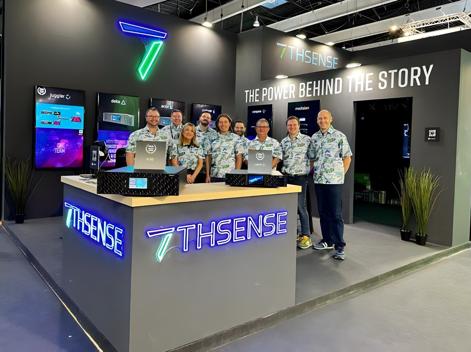 Custom Neon® blue and green tradeshow signage @7thsense00 @ise_show