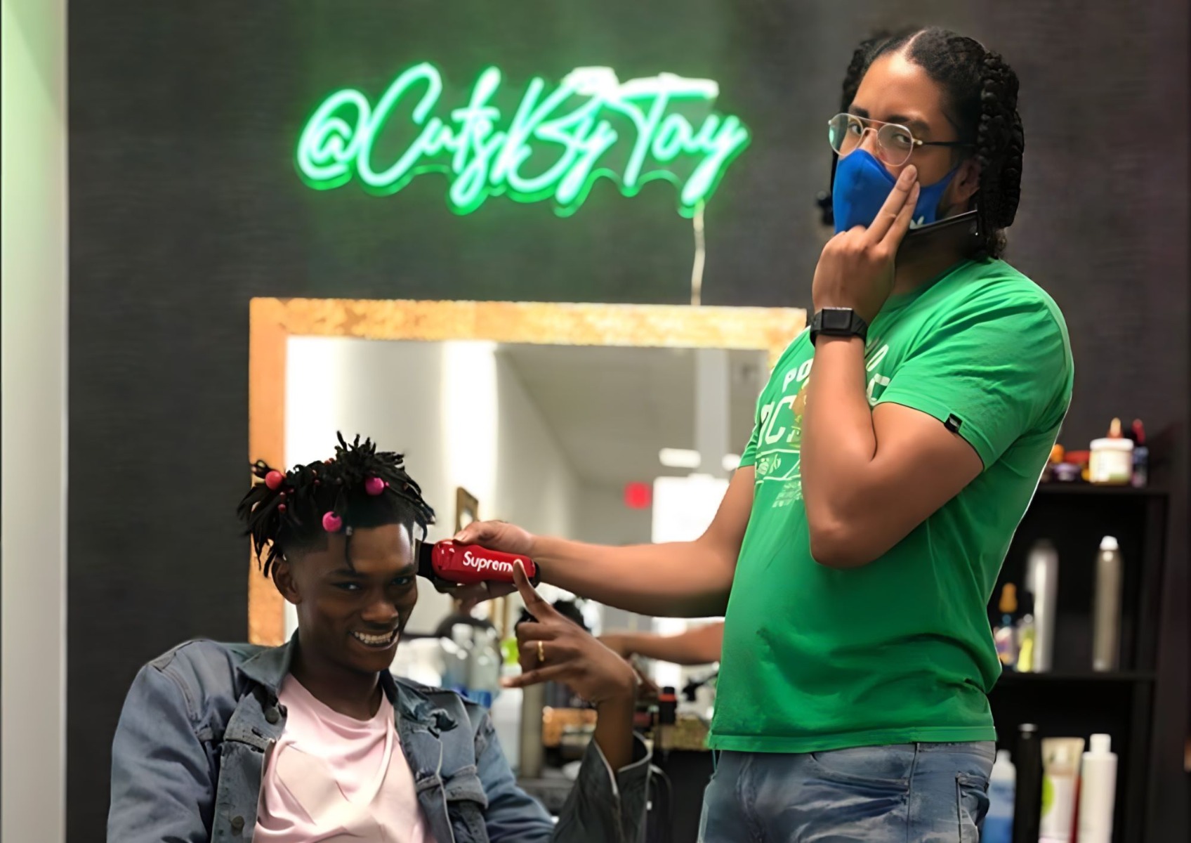 Green Custom Neon® barbershop social media handle sign @cutsbytay